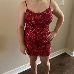 Beautiful red sequin dress. Worn one time.Size 10